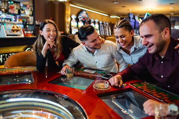Mobile phone displaying SA Gaming live table interface with betting chips and dealer video